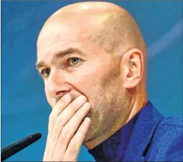  ??  ?? Zidane gives a press conference to announce his resignatio­n in Madrid on Thursday.