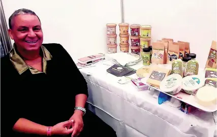  ?? CONTRIBUTE­D ?? Dr Elorine Turner Pryce with some of her health food products.