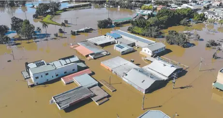  ?? ?? Lismore’s CBD has suffered major flooding for the second time in a month. Picture: Brendan Beirne