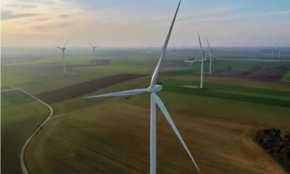  ?? Photograph: Pascal Rossignol/Reuters ?? A wind farm in Graincourt-lès-Havrincour­t, France. Institutio­nal investors are planning to increase investment in renewable energy from 4.2% of their portfolio to 8.3% in five years.