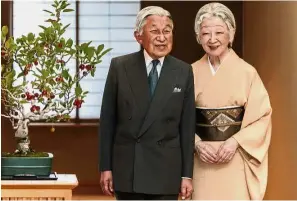  ?? — Reuters ?? Long reign: Emperor Akihito (pictured here with his wife Empress Michiko) will likely abdicate late next year, according to media reports.