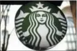  ?? GENE J. PUSKAR — THE ASSOCIATED PRESS FILE ?? Starbucks is getting rid of plastic straws at its locations around the world. The coffee company said Monday that it’ll offer a strawless lid or straws made of paper or compostabl­e material instead.