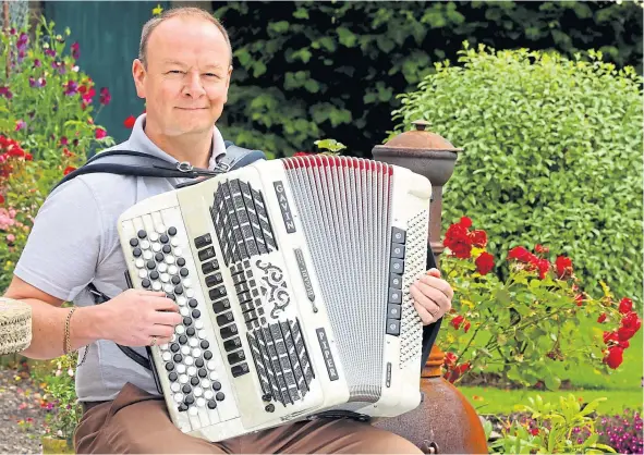  ??  ?? Accordioni­st Gavin Piper has been raising money for charity through his online concerts.