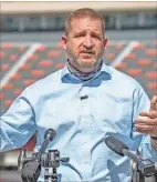  ?? Kathryn Skeean, The Red & Black ?? Senior deputy athletic director Josh Brooks speaks to reporters on Sept. 23 in Sanford Stadium in Athens.