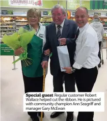  ??  ?? Special guest Regular customer Robert Wallace helped cut the ribbon. He is pictured with community champion Ann Seagriff and manager Gary McEwan