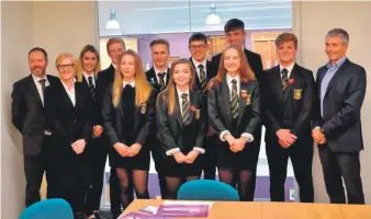  ??  ?? Peter Bain, Norwegian head teachers Wenche Rudshaug Kavali and Olav Wennemo, and pupils from Oban High School.