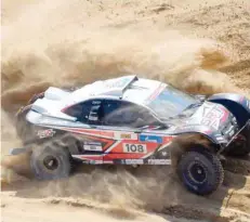  ?? — AFP ?? MCM Franch pilot Mathieu Serradori and Belgian co-pilot Fabian Lurquin compete during the fourth leg of the Silk Way Rally 2018 Astrakhan-astrakhan.