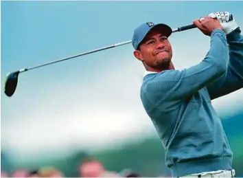  ?? AFP ?? Tiger Woods in action at the 2015 British Open. Former world number one Woods has been recruited by US captain Davis Love as a team tactician for next week’s Ryder Cup.