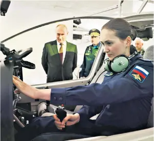  ?? ?? Vladimir Putin, seen visiting the Krasnodar Higher Military Aviation School of Pilots, knows Europe will pay a high price to oppose him