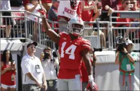  ?? JAY LAPRETE — THE ASSOCIATED PRESS ?? Ohio State receiver K.J. Hill celebrates his touchdown against UNLV during the first half.