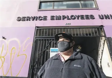  ?? Photos by Noah Berger / Special to The Chronicle ?? Janitor Ramiro Rodriguez, whose hours have been cut, also worries about contractin­g COVID19 on the job.