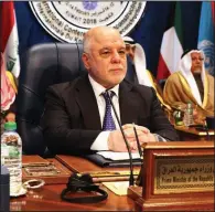  ?? AP/JON GAMBRELL ?? At a Kuwait internatio­nal donors meeting Wednesday to raise funds to rebuild Iraq, Iraqi Prime Minister Haider al-Abadi acknowledg­ed corruption in his nation and vowed to never stop fighting it.