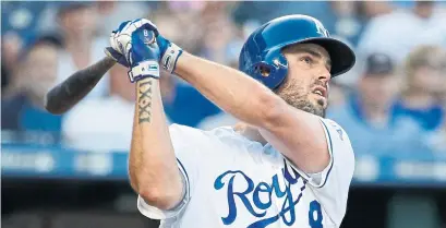  ?? CHARLIE RIEDEL/THE ASSOCIATED PRESS ?? Power-hitting third baseman Mike Moustakas could fetch a decent return for the Royals, after re-signing him at a bargain rate.