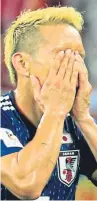  ??  ?? Yuto Nagatomo is distraught as the fulltime whistle blows.