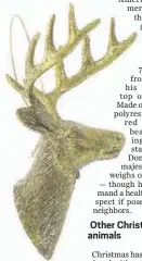  ?? COURTESY OF NATURAL HISTORY MUSEUM ?? London’s Natural History Museum offers a 5-inchtall version of a stag’s head as a “Christmas classic, finished with antique gold style coloring.”