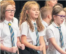  ??  ?? Pupils from St Bride’s Primary School in Cowdenbeat­h singing at last year’s event.