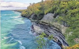  ?? CHELSEY LEWIS/MILWAUKEE JOURNAL SENTINEL FILE ?? Michigan’s Pictured Rocks National Lakeshore is using electric trail and ground maintenanc­e equipment to achieve net-zero carbon emissions.