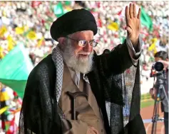  ?? — Reuters photo ?? Khamenei waves his hand to thousand of Basij members at Azadi stadium in Tehran.