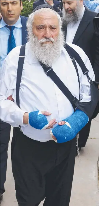  ?? Picture: AFP ?? Rabbi Yisroel Goldstein was shot in the hands during a deadly synagogue attack.