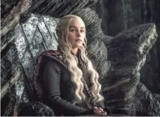  ?? HELEN SLOAN, HBO ?? Dany (Emilia Clarke) and Thrones near the end of Season 7.