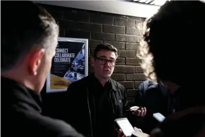  ?? ?? Andy Burnham speaks to journalist­s at Goodison Park on Sunday. Photograph: Paul Greenwood/Shuttersto­ck