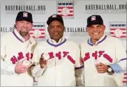  ?? AP PHOTO BY MARY ALTAFFER ?? In this Jan. 19, file photo, Hall of Fame inductees Jeff Bagwell, left, Tim Raines, center, and Ivan Rodriguez, poses for a photo during a news conference, in New York.