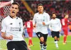  ?? AP ?? Liverpool’s Philippe Coutinho (left) celebrates after scoring during the Champions League match away to Spartak Moscow on Tuesday.