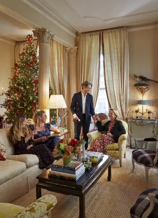  ?? ?? “We often sit around the living room and pull out all our treasured family ornaments, from those I had as a young bride to gifts from loved ones now gone but thankfully still in our memories,” says Branca, shown with (from left) daughter-in-law Georgia Uihlein, daughter Anna Lucia Uihlein, and son Andrew Uihlein.
