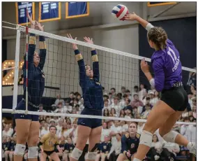  ?? (NWA Democrat-Gazette/Caleb Grieger) ?? Shiloh Christian’s Mary Carolyn Reese (far left) and Carolie Red jump to block a shot by Fountain Lake’s Addison Moore on Thursday during the Saints’ 3-0 victory over the Cobras in the semifinals of the Class 4A state volleyball tournament in Springdale. Visit nwaonline.com/photo for today’s photo gallery.