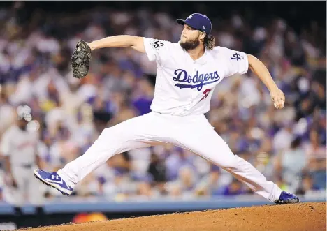  ?? HARRY HOW/GETTY IMAGES ?? The Dodgers’ Clayton Kershaw is 3-0 in this year’s playoffs after Los Angeles took Game 1 of the World Series.