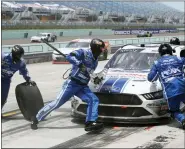  ?? WILFREDO LEE — THE ASSOCIATED PRESS ?? Chase Briscoe (98) makes a pit stop during a NASCAR Xfinity Series auto race Sunday, June 14, 2020, in Homestead, Fla.