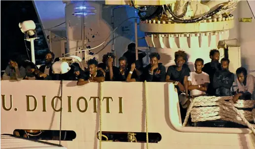  ?? AP ?? A decision to keep migrants aboard the Italian Coast Guard ship Diciotti has left Italy’s interior minister Matteo Salvini facing a kidnapping charge.