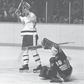  ?? RON BULL/TORONTO STAR FILE PHOTO ?? Darryl Sittler celebrates one of his six goals — to go with four assists — on Boston goalie Dave Reece in 1976.