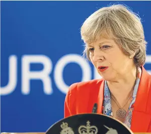  ?? Picture: AP. ?? Prime Minister Theresa May will offer devolved government­s a role in shaping the Brexit deal.