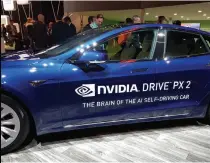  ??  ?? Semiconduc­tor chip companies such as Nvidia and Intel create the “brains” of self-driving cars.