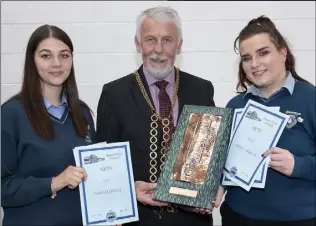  ??  ?? Arts and Music: the Helen Rath Award. Sarah Doyle and Jessica Horan with Cllr Jim Moore.
