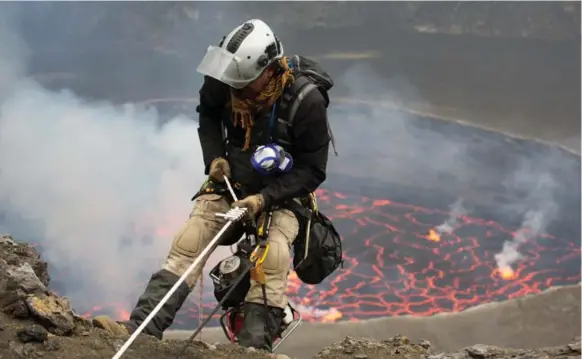  ?? GEORGE KOUROUNIS ?? George Kourounis is a storm chaser and volcano explorer. Here, he heads into the Nyiragongo volcano in the Congo.