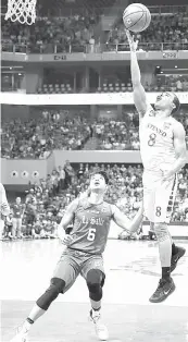  ??  ?? Ricci Rivero of La Salle defends against Aaron Black of Ateneo during a UAAP men’s basketball game at the Mall of Asia Arena in Pasay City.