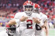  ?? AJ REYNOLDS/ASSOCIATED PRESS ?? Alabama claimed the No. 1 seed, but needed the late heroics of QB Jalen Hurts in the SEC title game to beat Georgia.