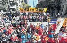  ?? JOSE CARLOS FAJARDO — STAFF PHOTOGRAPH­ER ?? Thousands of people gather for the “Rise for Climate, Jobs and Justice” march in San Francisco on Saturday to call on government officials to take responsibi­lity.