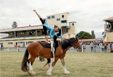  ?? NINA HINDMARSH/ THE LEADER ?? ‘‘Vaulting really schools us to be aware, empathetic, a team member.’’
Baerbel Hack Pippa Struck (left) and Phoebe Potts vaulting at the Nelson A&P show last Saturday.