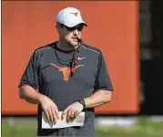  ?? CONTRIBUTE­D BY STEPHEN SPILLMAN ?? Tom Herman told high school coaches that Texas will run a pro-spread style offense that uses play-action passes out of the shotgun.