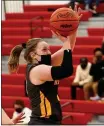  ?? GEORGE SPITERI — FOR MEDIANEWS GROUP ?? Rochester Adams’ Maddie Dolenga hit a buzzer-beater at the end of regulation and at the end of overtime to lift Rochester Adams to a 64-63 win over Romeo in a Division 1district opener on Monday at Romeo High School.