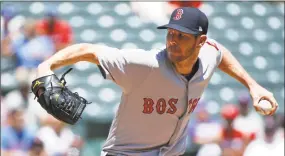  ?? Ron Jenkins / Getty Images ?? Chris Sale throws against the Rangers during the first inning at Globe Life Park on Sunday in Arlington, Tex.