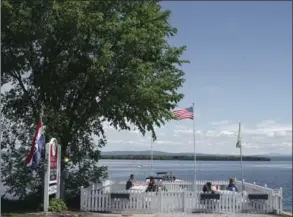  ??  ?? A view of Lake Champlain from the town of North Hero. The islands of Lake Champlain are an outdoor lover’s paradise, with state parks, beaches, campground­s, farms, orchards and copious trails ideal for exploring by bicycle.