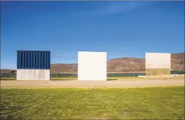  ?? Kent Nishimura Los Angeles Times ?? WALL PROTOTYPES along the U.S.-Mexico border in February. California has sued over the proposed wall.