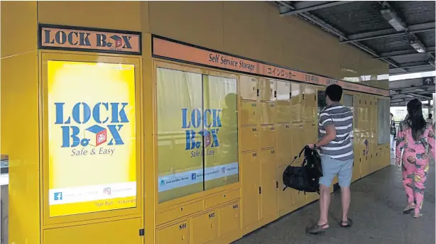  ?? WALAILAK KEERATIPIP­ATPONG ?? Lock Box on the walkway to BTS Sala Daeng station offers convenient storage facilities.