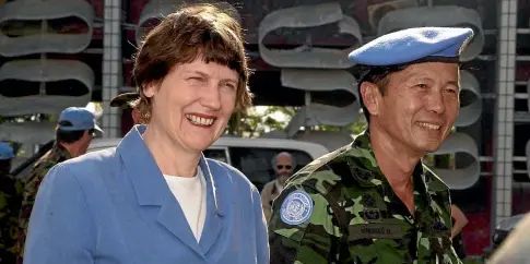  ?? SARAH JARDINE ?? Helen Clark gave the green light to the September 6, 2000, rescue of UN workers in West Timor. Before the end of the month, the prime minister was visiting Peacekeepi­ng Force Commander Lieutenant general Boomsrang Niumpradit in East Timor.