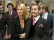 ?? THE ASSOCIATED PRESS ?? Gywneth Paltrow, left, and Johnny Depp appear in a scene from “Mortdecai.”