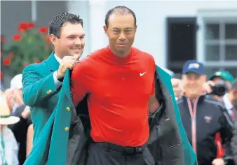  ?? DAVID CANNON/GETTY ?? Tiger Woods won the Masters in April for his 15th major championsh­ip and first in 11 years. Woods failed to qualify for this week’s Tour Championsh­ip, which he won last year.